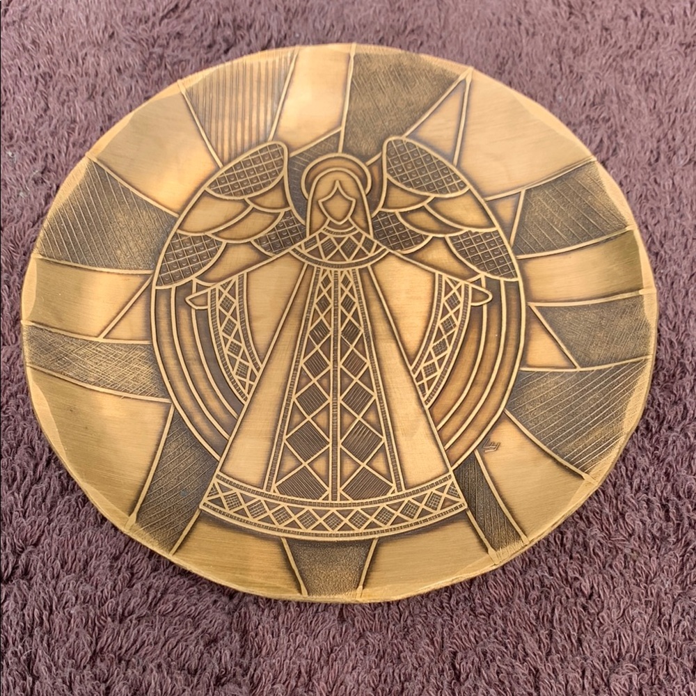 Decorative Angel Plate in brass.